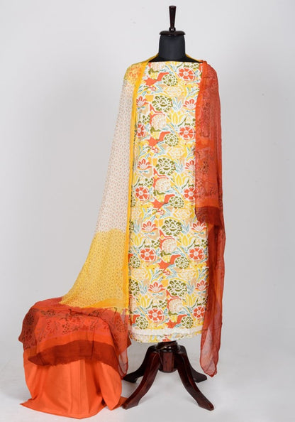 Beautiful Yellow Block Printed dress material in Cotton cambric with Chiffon dupatta.
